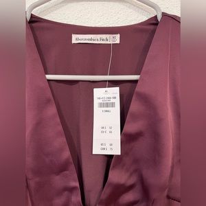 Ambercombie & Fitch Burgundy V neck top. Size XS. Never worn.